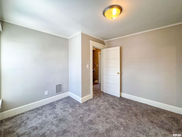 unfurnished bedroom featuring carpet floors and ornamental molding