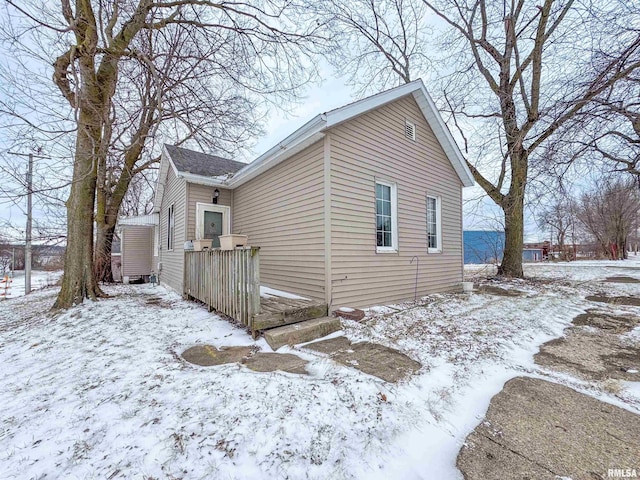 view of snow covered property