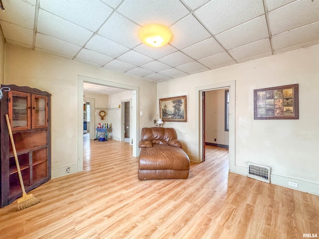 sitting room featuring light wood-type flooring