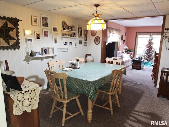 view of carpeted dining space