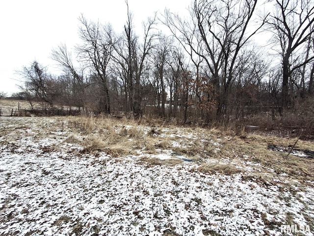 view of snow covered land