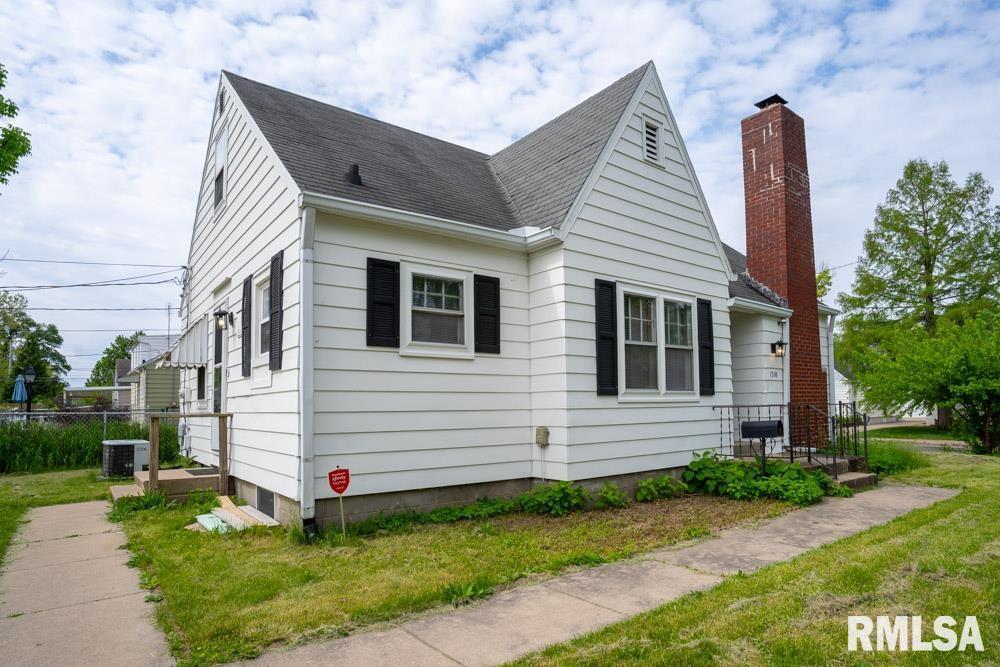 view of home's exterior with central AC