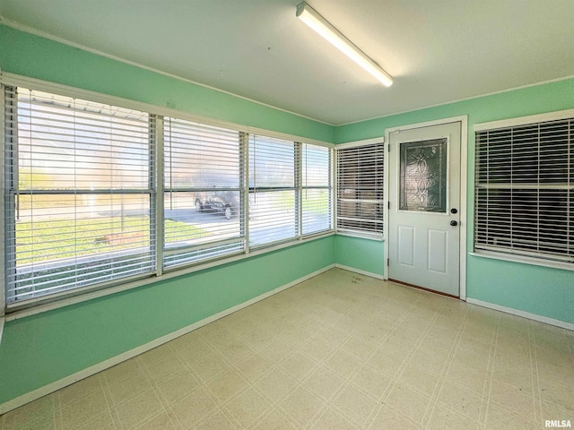 view of unfurnished sunroom