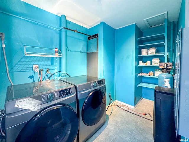 laundry area featuring washer and clothes dryer