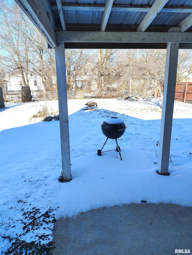 view of yard covered in snow