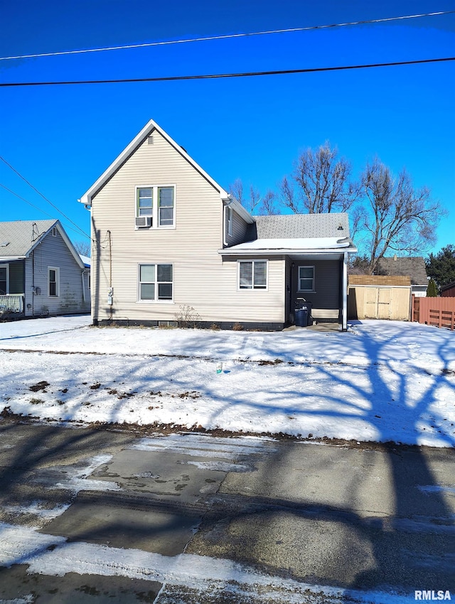 view of snow covered property