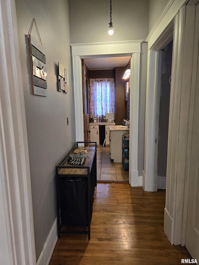 505 W Main St, La Harpe, IL 61450 - corridor with dark wood-style floors