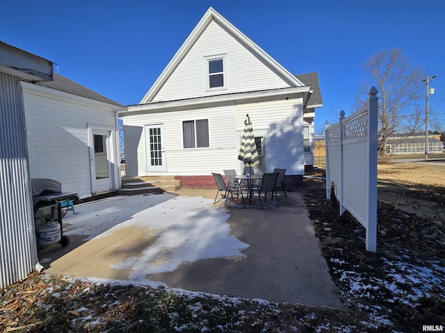 rear view of house featuring a patio area