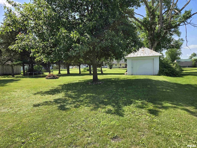 505 W Main St, La Harpe, IL 61450 - view of yard with a storage unit
