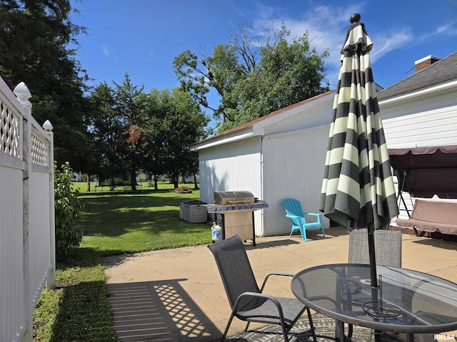 505 W Main St, La Harpe, IL 61450 - view of patio / terrace with area for grilling and outdoor dining area