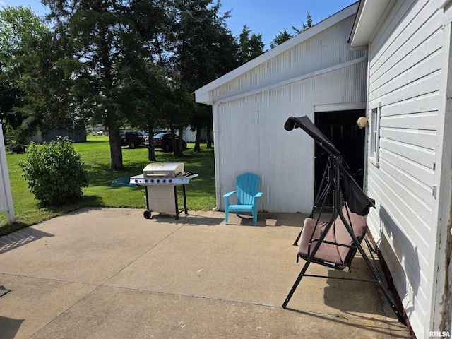 505 W Main St, La Harpe, IL 61450 - view of patio featuring a grill