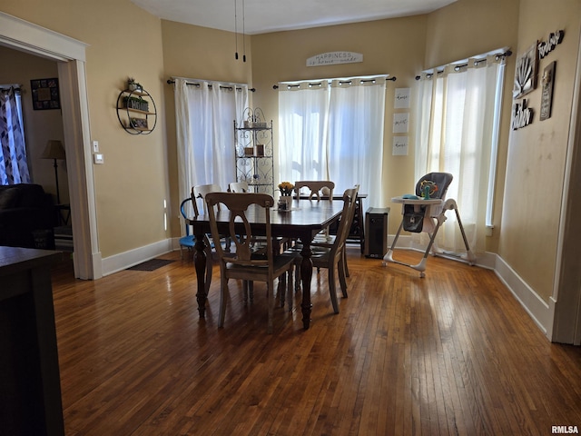 505 W Main St, La Harpe, IL 61450 - dining space featuring dark wood-style flooring