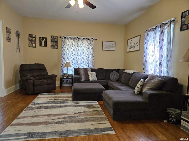 505 W Main St, La Harpe, IL 61450 - living room with ceiling fan and wood finished floors