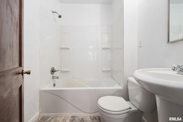 full bathroom featuring bathing tub / shower combination, sink, and toilet