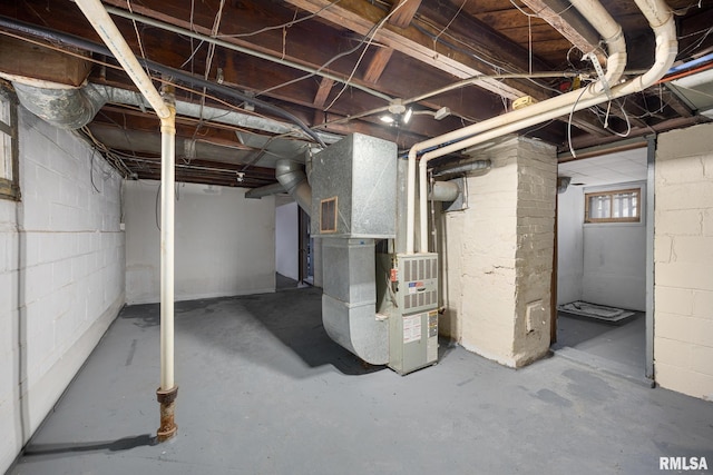 basement featuring heating unit