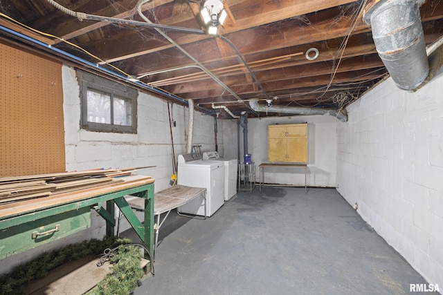 basement featuring washing machine and dryer