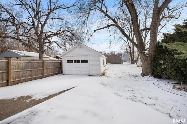 view of snow covered garage