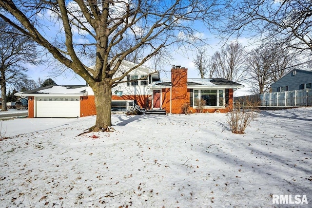 view of front of home with a garage