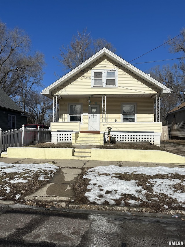 bungalow-style home with a porch