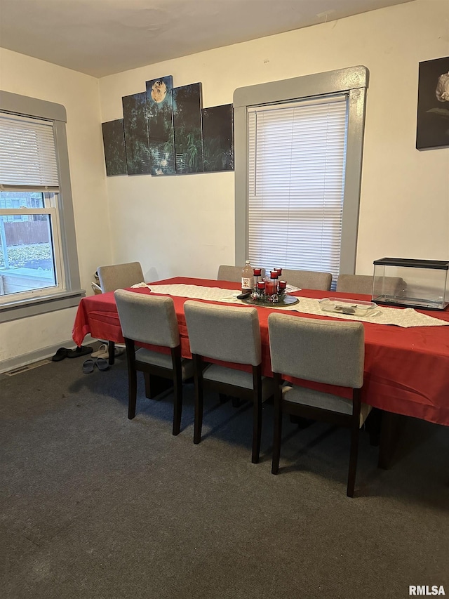 view of carpeted dining space