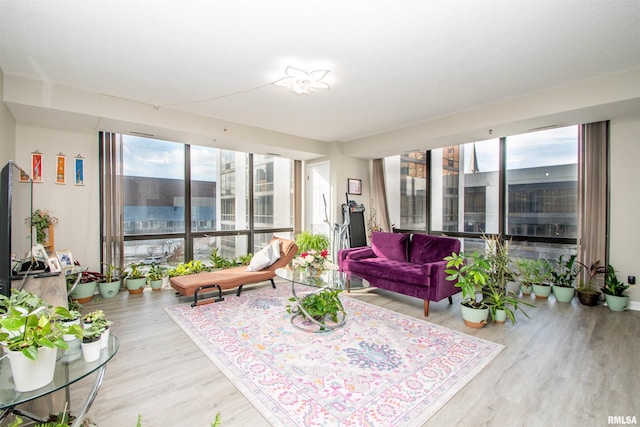 123 SW Jefferson St Unit E4W, Peoria, IL 61602 - sunroom with healthy amount of natural light