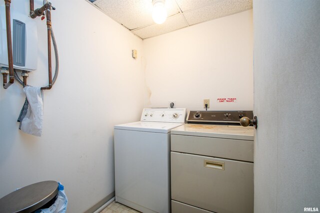 123 SW Jefferson St Unit E4W, Peoria, IL 61602 - laundry room featuring washing machine and clothes dryer and water heater