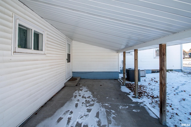 snow covered patio with central AC