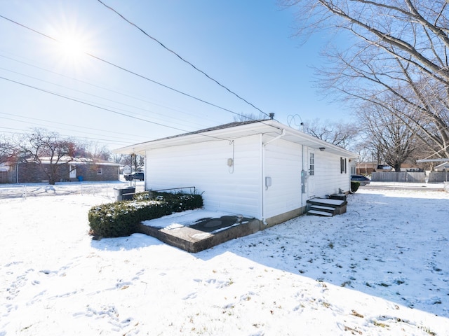 view of snow covered property