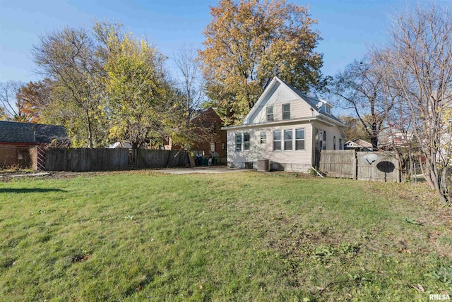 view of yard with central AC