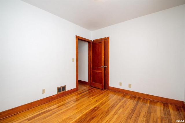 empty room featuring light hardwood / wood-style floors