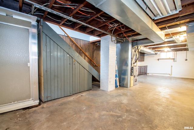 basement featuring heating unit