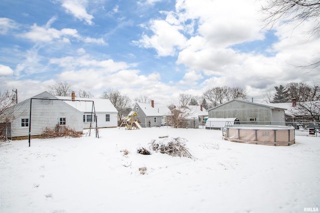 view of yard covered in snow