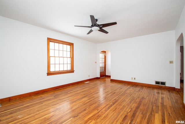 spare room featuring ceiling fan and wood-type flooring