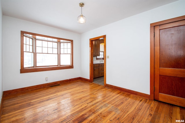 empty room featuring light hardwood / wood-style floors