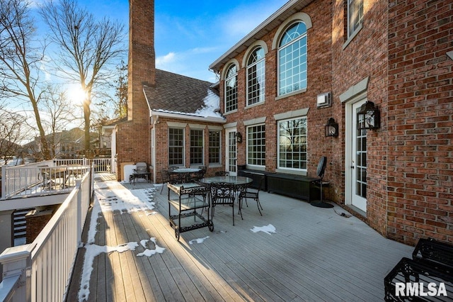 view of snow covered deck