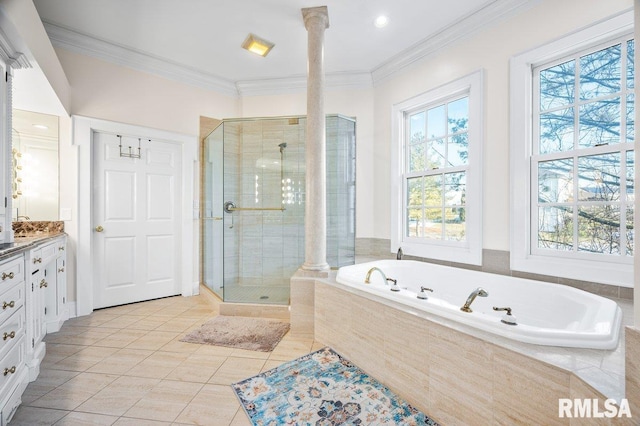 bathroom featuring tile patterned flooring, vanity, separate shower and tub, and plenty of natural light