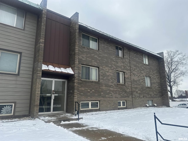 view of snow covered building