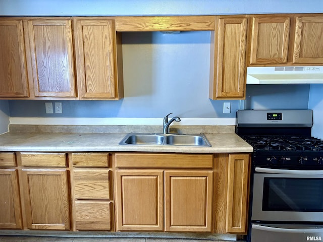 kitchen featuring sink and stainless steel gas range