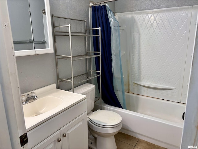 full bathroom featuring tile patterned floors, vanity, shower / bath combination with curtain, and toilet