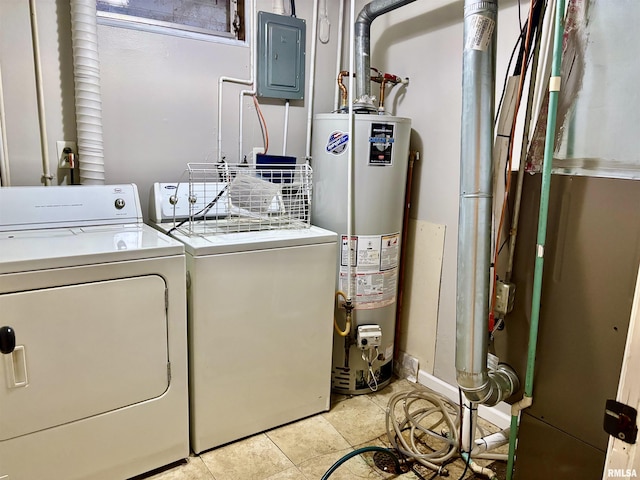 clothes washing area featuring light tile patterned floors, water heater, washer and dryer, laundry area, and electric panel