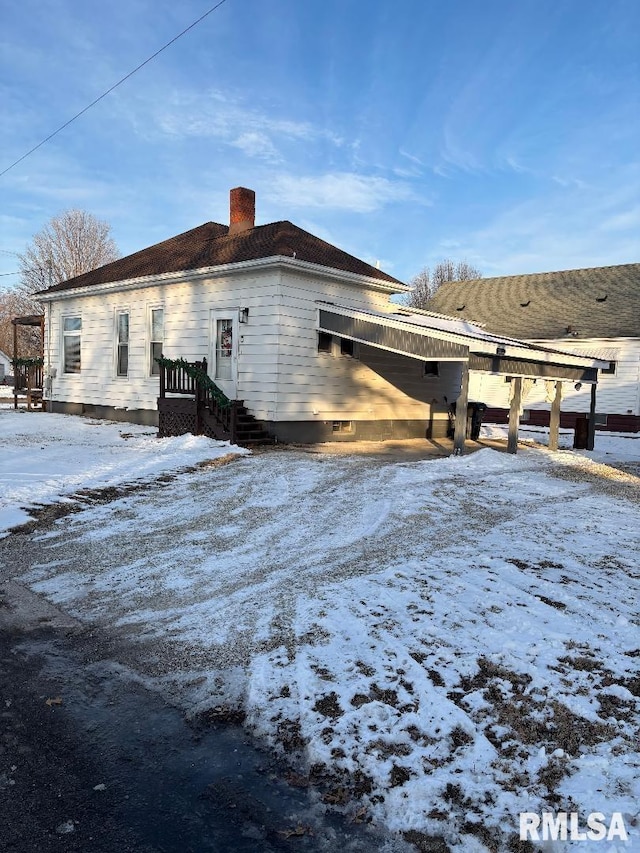 view of snowy exterior