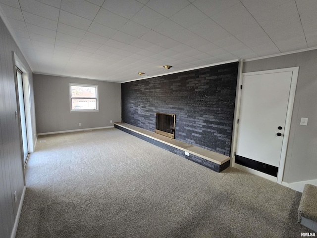 unfurnished living room featuring light colored carpet and ornamental molding