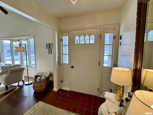 entrance foyer featuring dark hardwood / wood-style flooring