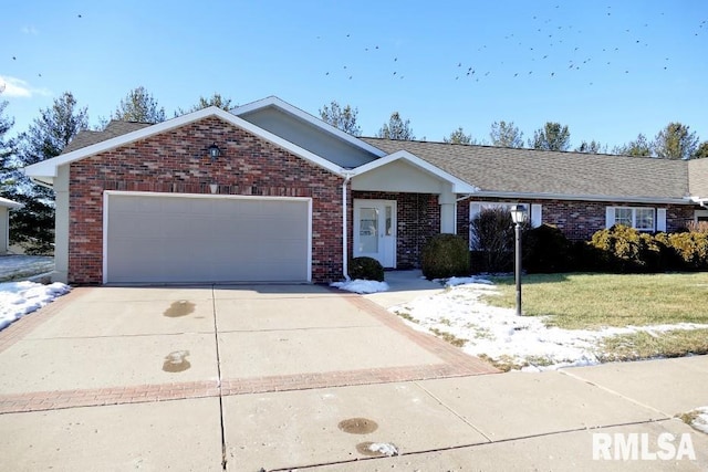 ranch-style house with a garage and a front yard