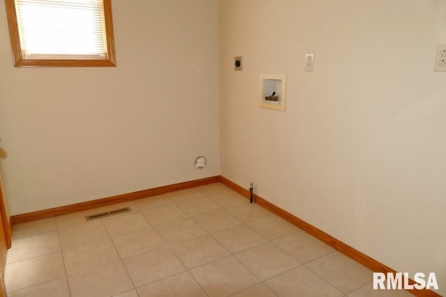 clothes washing area with washer hookup and hookup for an electric dryer