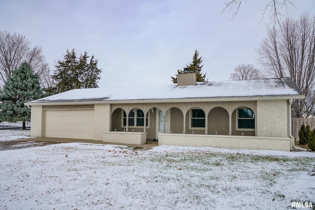 ranch-style home with a garage