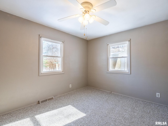 unfurnished room featuring carpet flooring and ceiling fan