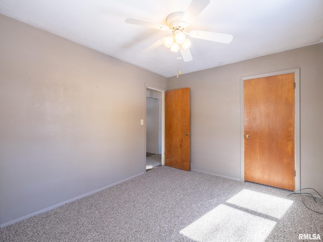 unfurnished bedroom with carpet, ceiling fan, and a closet