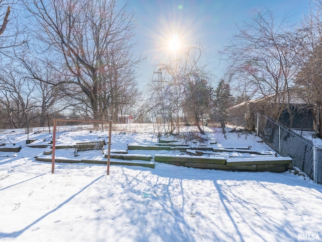 view of yard layered in snow