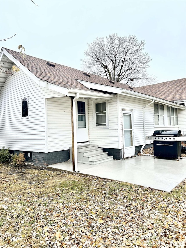 rear view of property with a patio area